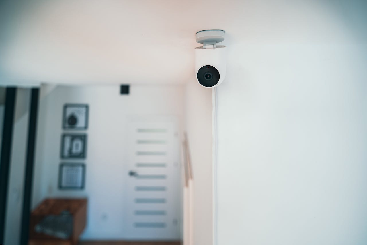 gallery-03 A sleek indoor security camera installed in a contemporary home for monitoring and safety.